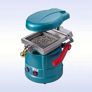 Machine de thermoformage pour laboratoires dentaires