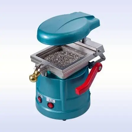 Machine de thermoformage pour laboratoires dentaires