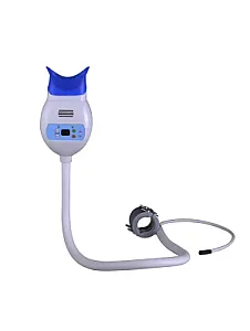 Lampe de blanchiment montée sur fauteuil.